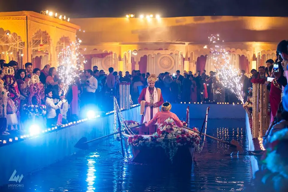 Wedding bride groom entry with boat ride